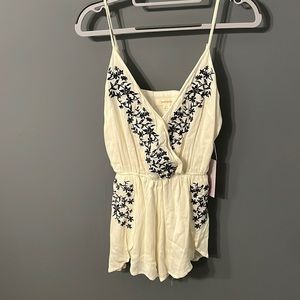 Onetheland romper